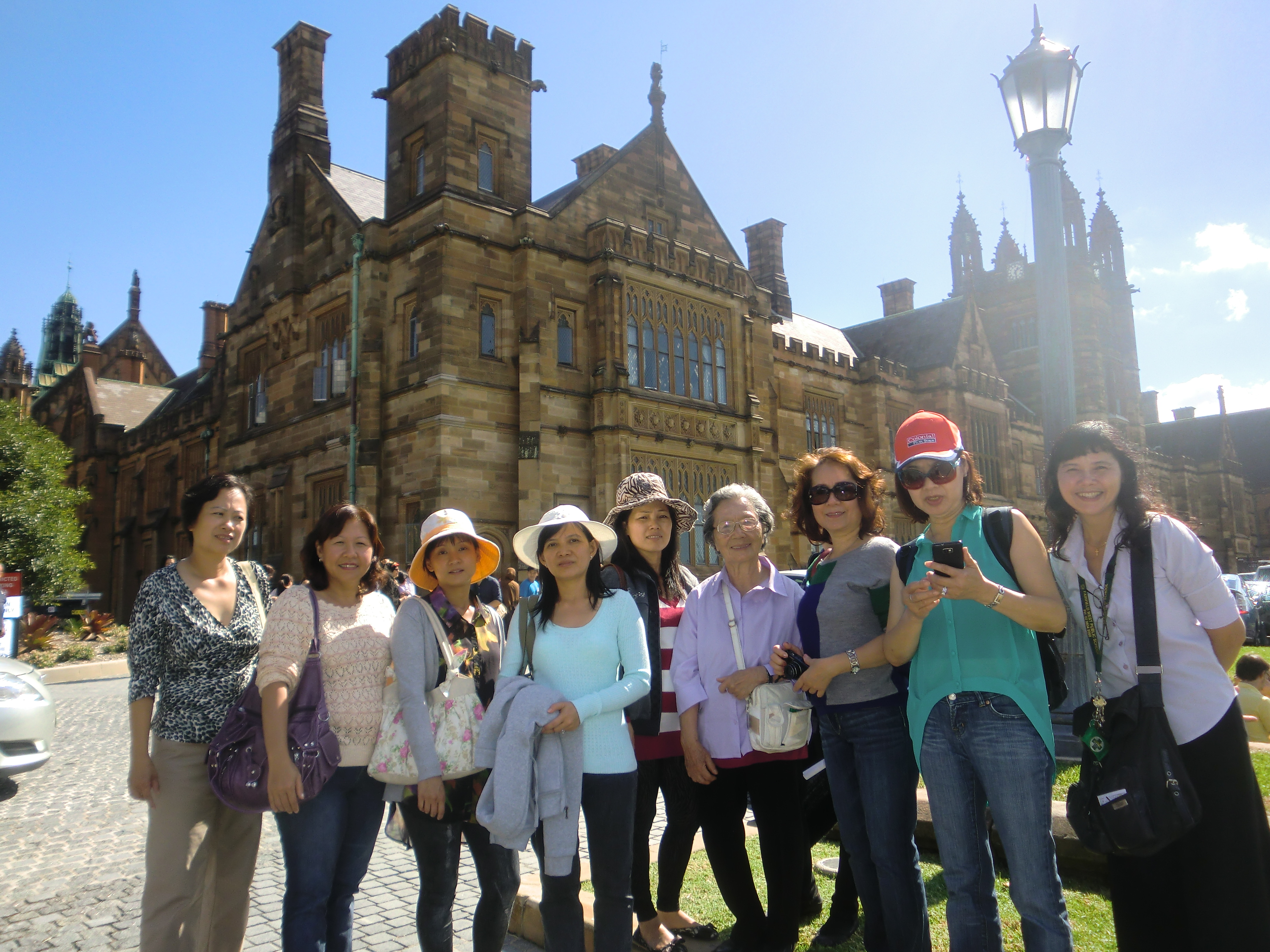 Vietnamese and Arabic parents standing in the city